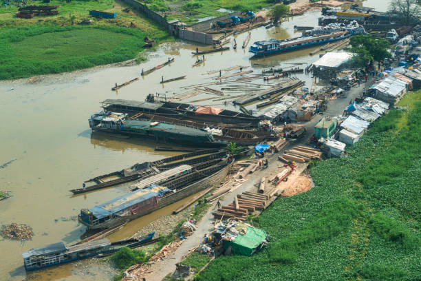 Kinshasa, Democratic Republic of Congo - December 13, 2014:Aerial view of the river port, docks and simple shipyards on the banks of the Congo River in the outskirts of the Congolese capital Kinshasa. The Congo River is the most important and often the only means of transporting goods and people in the Congo.