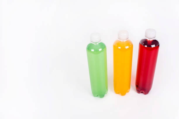 istock Energy drinks bottles with different flavors on a white background 1319681297
