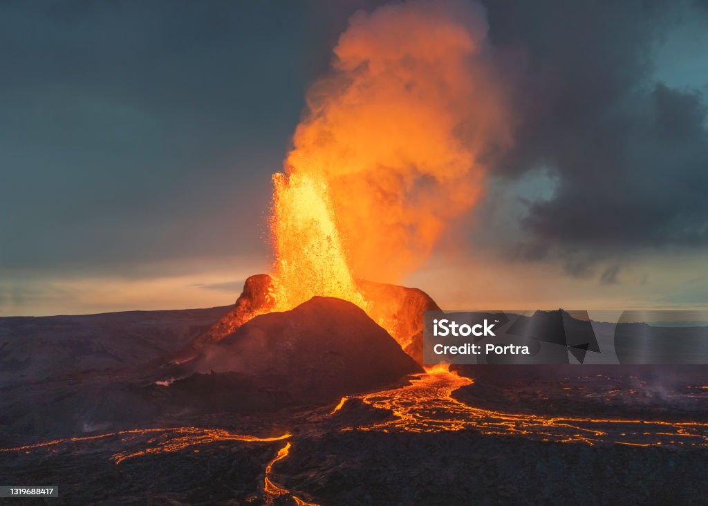 Volcanic eruption in Iceland Glowing lava from the volcano eruption in Iceland. Powerful volcanic show from Mother Nature in all its beauty Volcano Stock Photo