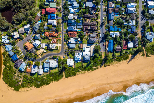 istock Coastal Suburb overhead perspective roof tops 1319690950