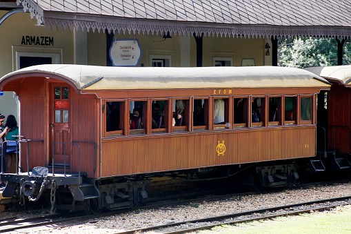 Minas Gerais, Brazil - May 25, 2019: locomotive wagon maria fumaca in motion at the station of the historic city Tiradentes, interior of Minas Gerais