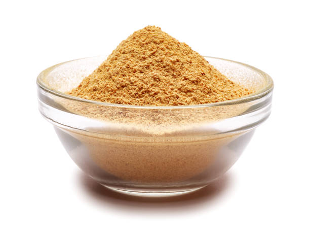 istock grinded organic ginger spice in ghass bowl isolated on white background 1319694368