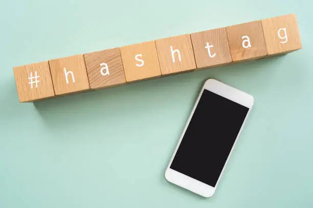 Photo of Hashtag; Wooden blocks with 