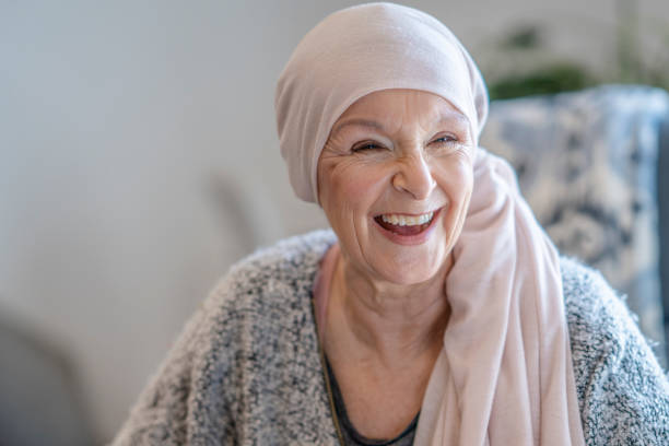 istock Smiling senior with cancer 1319694604