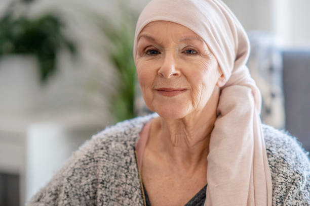 istock Smiling senior with cancer 1319694605