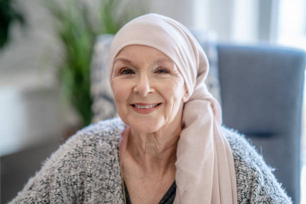 istock Smiling senior with cancer 1319694622