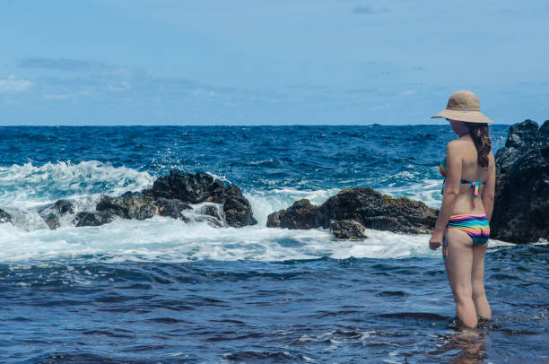 Lady, Ocean and Rocks