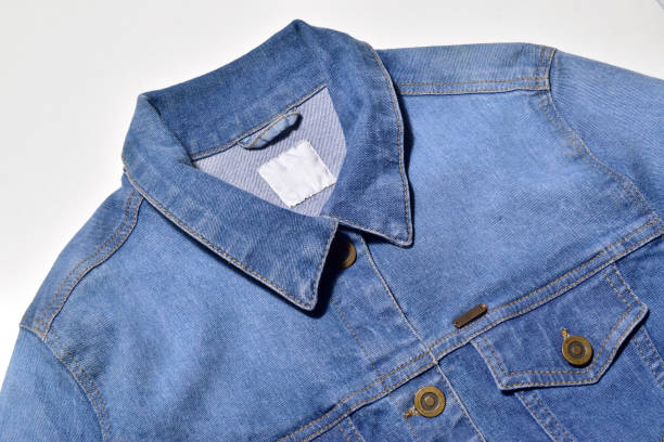 closeup of blue denim jacket isolated on white background with clipping path