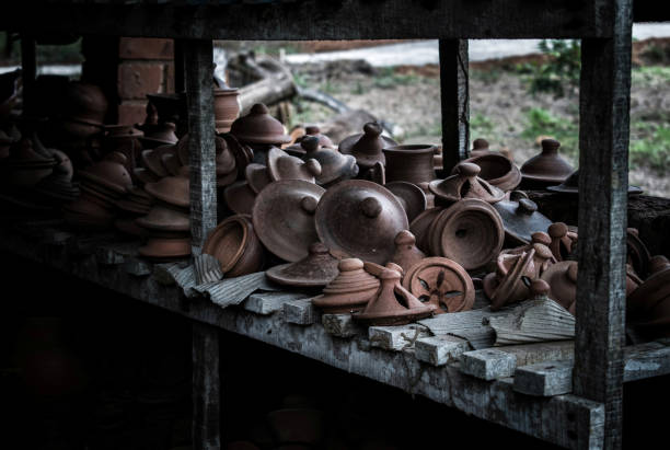 istock Collection of clay tagine in the workshop India. 1319704122