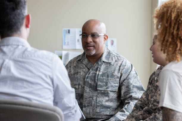 istock Senior military man talking during group therapy discussion 1319713337