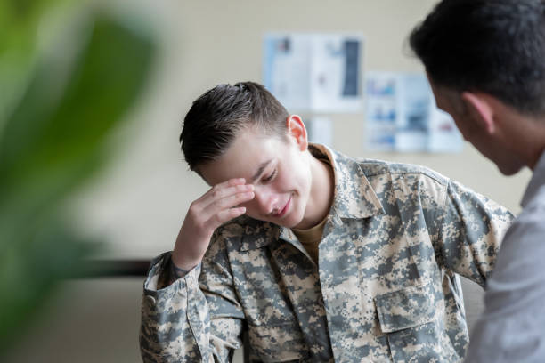 istock Young adult military man reflecting during one on one therapy session 1319713342