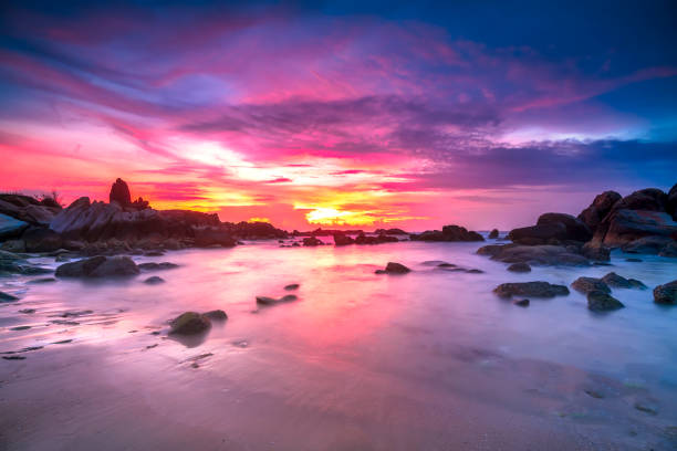 istock Beautiful sunrise on the beach 1319713734