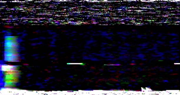 istock VHS screen digital glitch and noise. Videotape rewind mode. Black white static noise motion.old film grunge on black background realistic flickering 1319716927