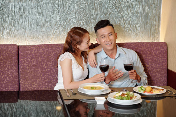 istock Young couple in fancy restaurant 1319720972