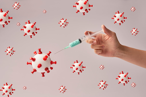 Conceptual image of COVID-19 vaccination.
The vaccine model is a Styrofoam ball and a thumbtack.
COVID-19 vaccine syringes.