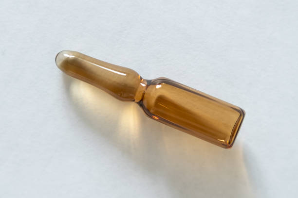 istock Medical ampoule lies on the table. 1319727511
