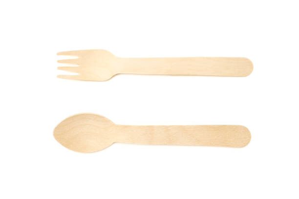 istock Wooden spoon and fork isolated on white background. 1319732548