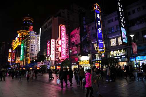 Shanghai, China - 12 02 2017: Shanghai China Nanjing road shopping street. The street is the main shopping district of the city and one of the world's busiest shopping districts.