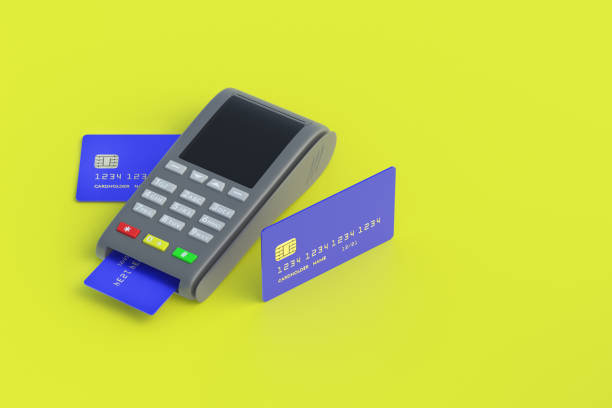 istock Portable cash register with plastic credit card on yellow background. Copy space. 3d render 1319741066