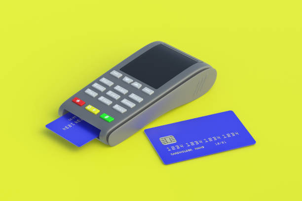 istock Portable cash register with plastic credit card on yellow background. 3d render 1319741877