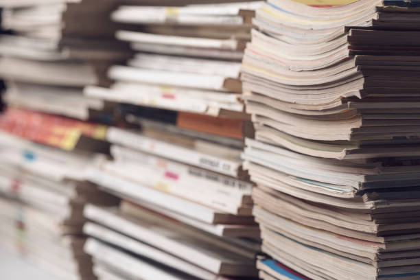 istock Stacks of magazines close up 1319741979