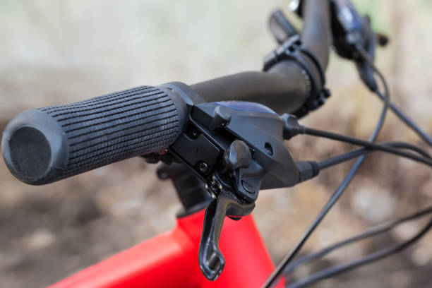istock Handlebar with brake levers of bicycle, close-up in selective focus 1319741994