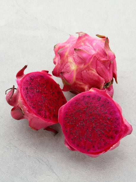 istock Fresh Dragon Fruits ( Buah Naga ) on the table. 1319742271
