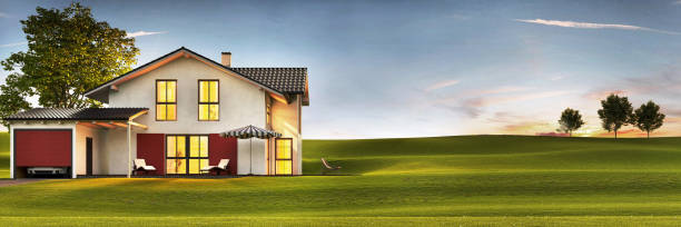 istock Modern home with a lawn and a terrace 1319746575