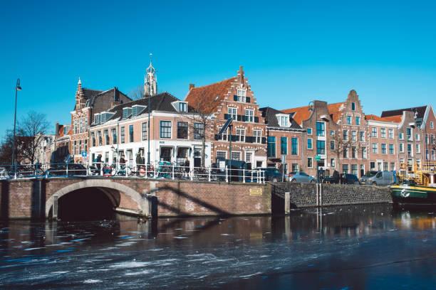 istock Bridge Over River Against Buildings 1319747598