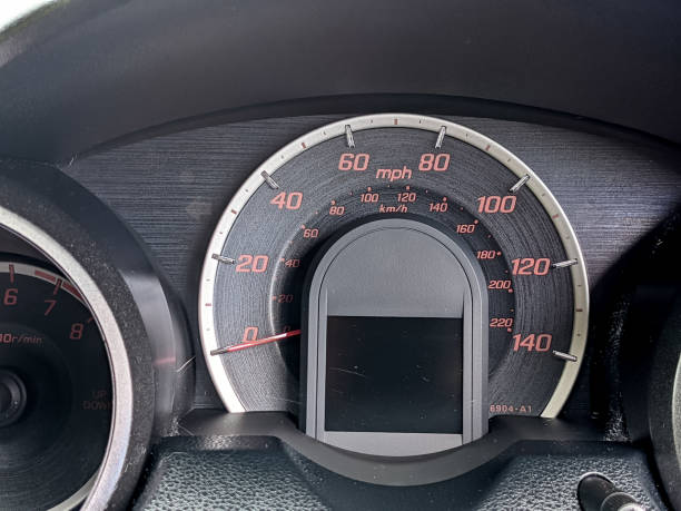 istock Classic car dashboard with speedometer and rpm gauge 1319748538