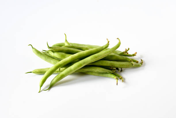 Freshness uncook green bean on white background. Vegetable nature food raw eatable , full with nutrition and vitamin. stock photo