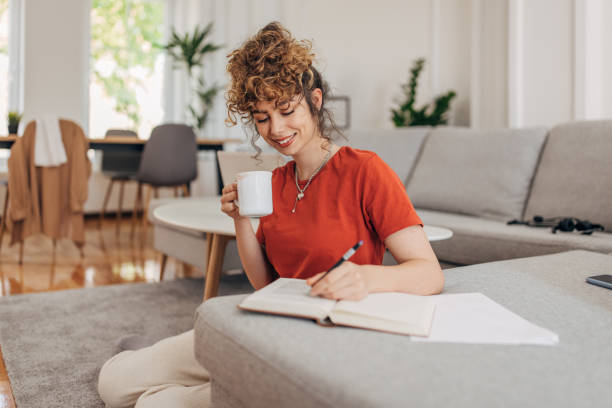 istock Young woman studying at home 1319750069