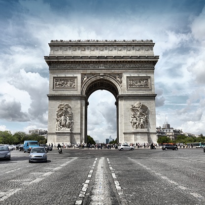 Paris, France - famous Triumphal Arch located at the end of Champs-Elysees street. UNESCO World Heritage Site. HDR photo.