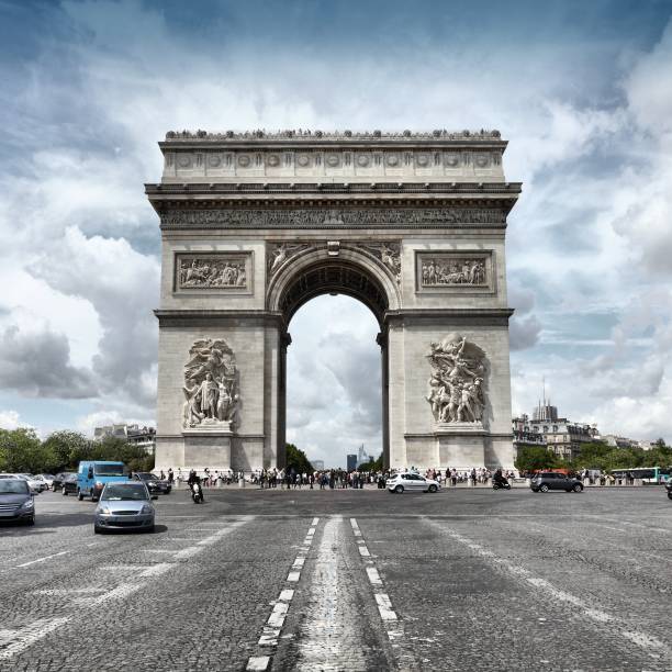 Triumphal Arch, Paris Paris, France - famous Triumphal Arch located at the end of Champs-Elysees street. UNESCO World Heritage Site. HDR photo. arc de triomphe paris stock pictures, royalty-free photos & images
