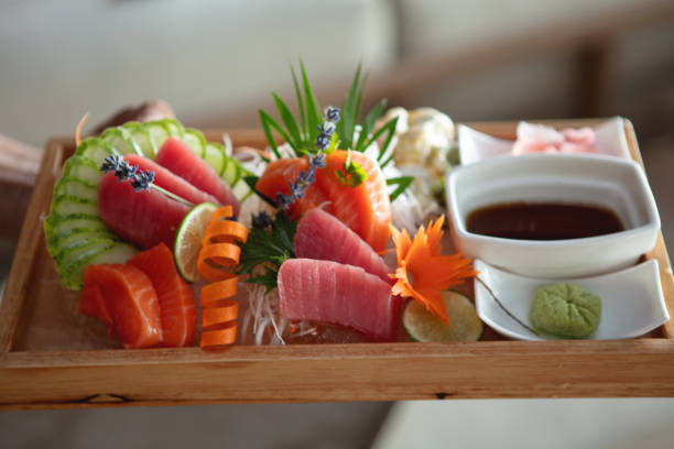 Japanese sashimi sushi set on white plate isolated on white background