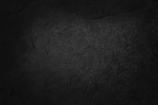 istock Dark grey black slate texture in natural pattern with high resolution for background and design art work. Black stone wall. 1319753029