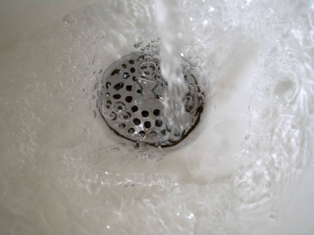 istock water flowing flushing running in the sink drops spray 1319755986