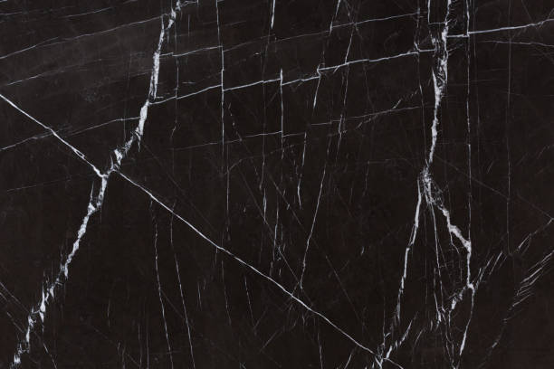 istock Elegant hard marble background in strict black tone. 1319761318