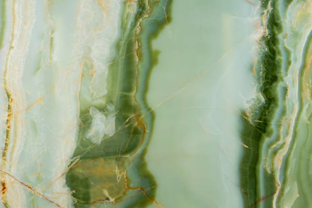 istock Beautiful green onyx texture with contrast surface. 1319761906