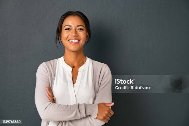 Portrait Of Smiling Mixed Race Woman Looking At Camera Stock Photo - Download Image Now