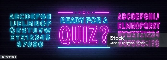 istock Ready for a Quiz neon sign on brick wall background. 1319764538