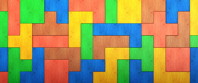 Colorful wooden puzzle background, front-view horizontal composition