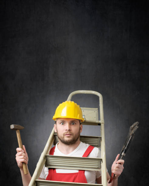 istock Portrait of a clumsy worker with tools 1319765896