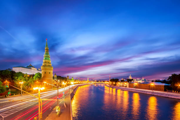 istock Moscow embankment view with Kremlin wall tower during summer sunset 1319767749
