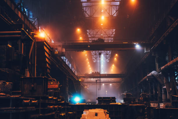 Heavy industry, industrial metallurgical plant workshop interior, steelmaking manufacturing Heavy industry, industrial metallurgical plant workshop interior, steelmaking manufacturing. steel mill stock pictures, royalty-free photos & images