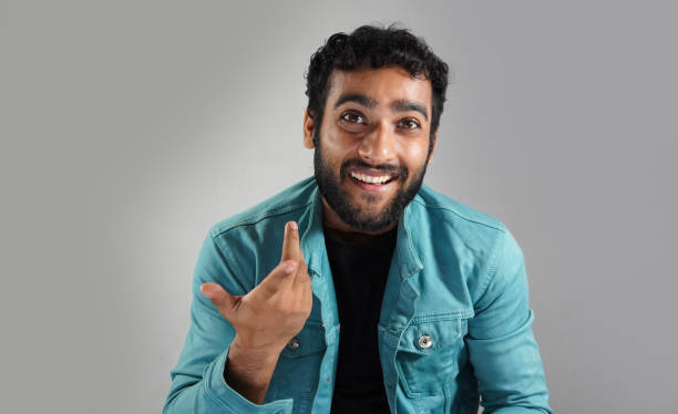 istock a man with asking for how are you in camera 1319770191