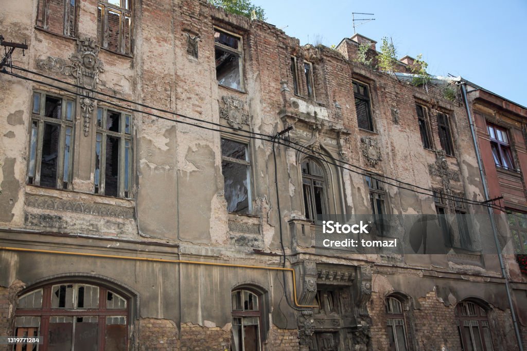 War ruined houses in Sarajevo, Bosnia and Hercegovina Bullet holes in the side of a building in Sarajevo. The capital city of Bosina and Hercegovina. War Stock Photo