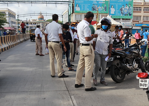 An Early morning drive by the Mysuru Traffic Police against the violators of the strict Lockdown rule during the Covid 19 curfew imposed in Mysuru, India.
