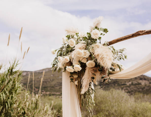 istock Part of a boho wedding altar outdoors 1319772929