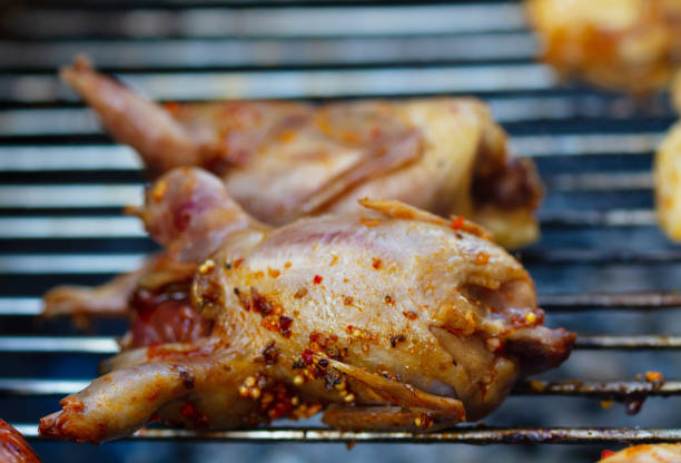 istock Grilled quail on a grill 1319778506